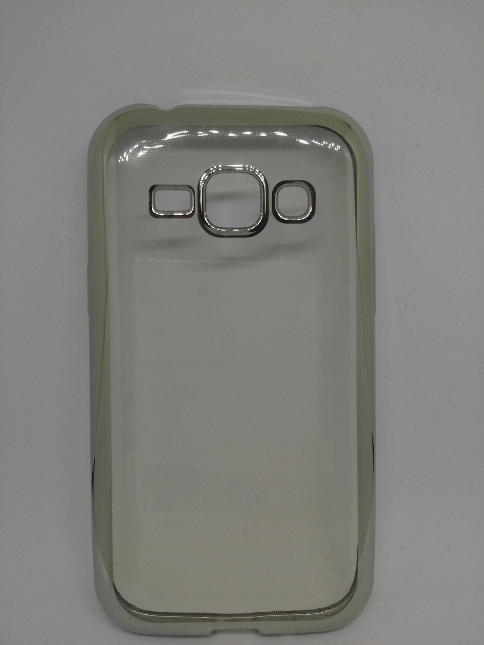 Силикон  0,3мм  с серебрянной  окантовкой для Samsung  J1 J100-0